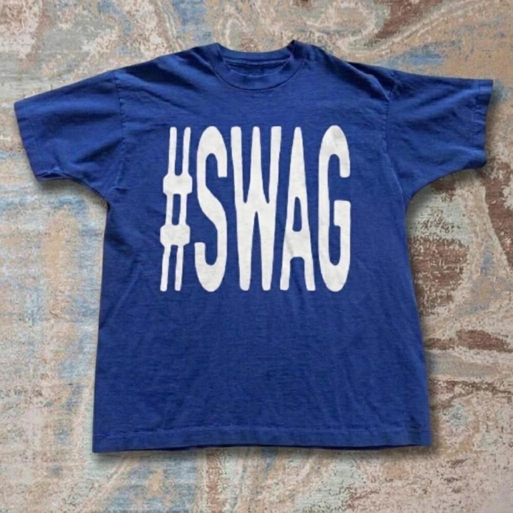 Blue Tee With White Text Reading